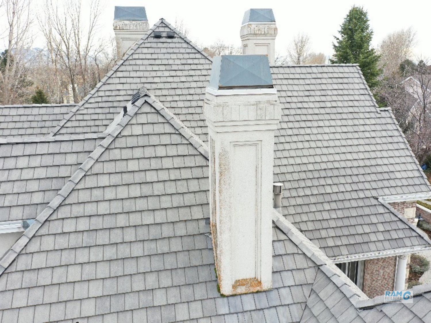 Chimney Repair Project Before by RAM Builders Stucco Exteriors
